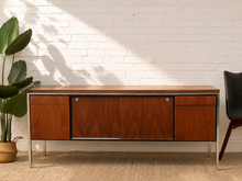 Load image into Gallery viewer, Vintage mid-century modern walnut credenza with chrome frame, long low profile, cabinet doors and rich wood grain.