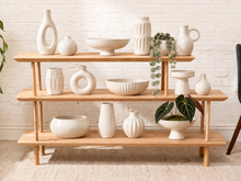 Load image into Gallery viewer, Three-tier solid wood display shelf with staggered open shelving, rounded supports, and natural light wood finish.