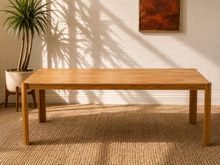 Load image into Gallery viewer, Vintage mid-century modern rectangular wood dining table with warm natural wood grain and clean minimalist lines.