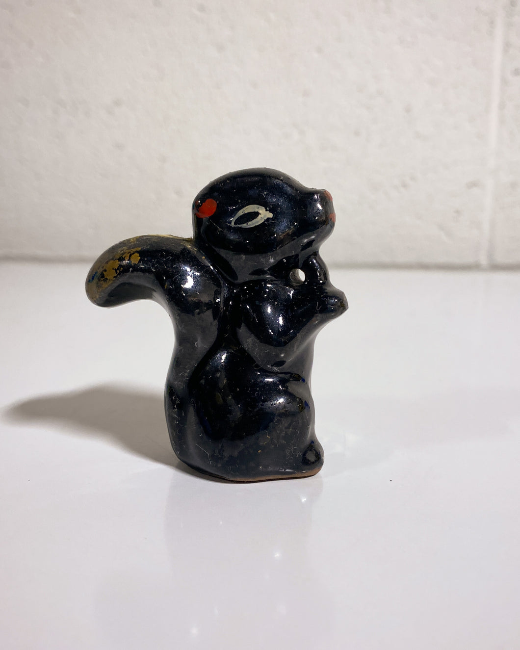 Vintage Black Ceramic Skunk Figurine