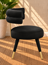 Load image into Gallery viewer, Althea Midnight Black velvet dining chair with deep channel tufted back and gold metal leg details