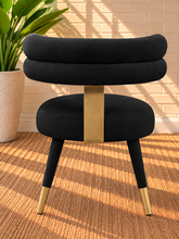 Load image into Gallery viewer, Althea Midnight Black velvet dining chair with deep channel tufted back and gold metal leg details