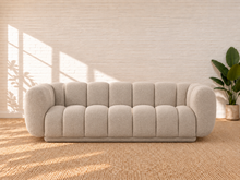 Load image into Gallery viewer, Image 1 of 4: Amanda upholstered sofa in Soft Biscuit chenille with rounded arms and vertical channel detailing