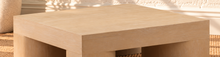 Load image into Gallery viewer, Arnold square coffee table in natural mindi wood veneer with a thick tabletop and sculptural curved supports.