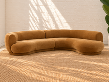 Load image into Gallery viewer, Audrey two-piece curved sectional sofa upholstered in mustard chenille with rounded arms and a sculptural wraparound back.