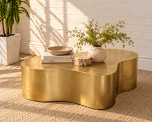 Load image into Gallery viewer, Aurelia abstract coffee table in an Aurum brushed gold metal finish with a sculptural freeform shape and softly curved edges.