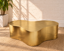 Load image into Gallery viewer, Aurelia abstract coffee table in an Aurum brushed gold metal finish with a sculptural freeform shape and softly curved edges.