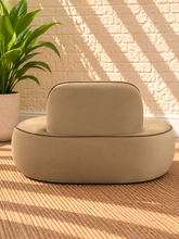 Load image into Gallery viewer, Image 4 of 4: Billy upholstered lounge chair in Camel velvet with brown piping and sculptural rounded silhouette