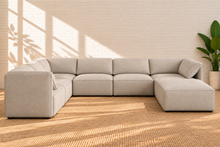 Load image into Gallery viewer, Image 2 of 5: Blaire 7-Piece Sectional Sofa in Cloud Gray with modular seating, tight back cushions, and low plastic legs