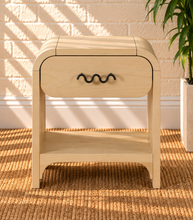 Load image into Gallery viewer, Byron Blonde Oak wood nightstand with curved frame, drawer, matte black metal handle, and open lower shelf.