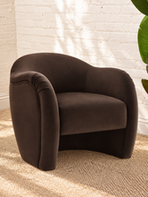 Load image into Gallery viewer, Capri lounge chair in Espresso performance velvet with curved barrel back, rounded arms, French piping, and pleated detailing