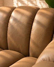 Load image into Gallery viewer, Casey honey brown genuine leather accent chair with rounded channel upholstery, curved arms and a slim wood base.