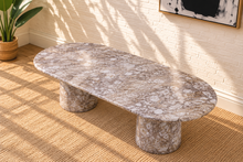 Load image into Gallery viewer, Celine oval dining table in Mocha brown marble finish with two sculptural tapered pedestal bases and rounded tabletop.