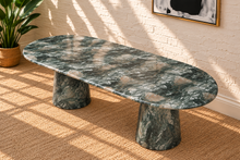 Load image into Gallery viewer, Celine oval dining table in Sage green marble finish with two sculptural tapered pedestal bases and rounded tabletop.