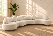 Load image into Gallery viewer, Cianne 3-piece sectional sofa in Creamy White velvet with organic curved seating, rounded pillows, and interchangeable gold or chrome legs.