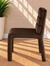 Load image into Gallery viewer, Conrad upholstered dining chair in Espresso velvet with deep channel-tufted back and sculptural upholstered frame