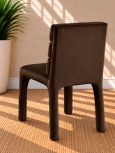 Load image into Gallery viewer, Conrad upholstered dining chair in Espresso velvet with deep channel-tufted back and sculptural upholstered frame