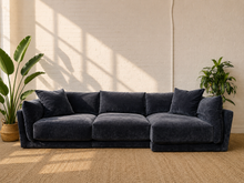 Load image into Gallery viewer, Oversized charcoal blue modular sofa with three deep seat cushions, plush back pillows, throw pillows and low-profile contemporary design.