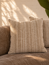 Load image into Gallery viewer, Ellie mocha beige curved two-piece sectional sofa with rounded arms, tight upholstered seat and back, and three coordinating throw pillows.