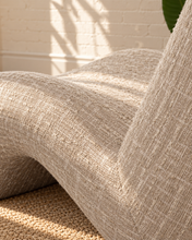 Load image into Gallery viewer, Emely ivory beige upholstered accent chair with textured fabric, armless sculptural wave silhouette and curved tight back.