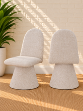 Load image into Gallery viewer, Ethel upholstered dining chair in Vanilla Oat interwoven polyester fabric with sculptural pedestal base