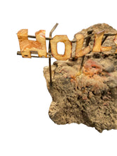 Load image into Gallery viewer, Miniature Copper Hollywood Sign on Volcanic Rock