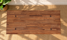 Load image into Gallery viewer, Felipe rectangular solid acacia dining table in natural brown with angled trestle legs, center stretcher and visible wood grain.