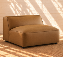 Load image into Gallery viewer, Florence caramel vegan leather four-piece modular sectional sofa with wide arms and square ottoman