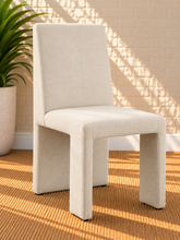 Load image into Gallery viewer, Foley upholstered dining chair in Ivory linen-textured fabric with sculptural fully upholstered frame