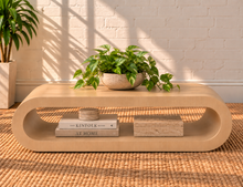 Load image into Gallery viewer, Gracielle Natural Oak coffee table with rounded continuous edges, elongated open center shelf, and sculptural contemporary design.