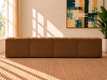 Load image into Gallery viewer, Hampton 4-piece sectional sofa in Caramel velvet with deep channel tufting, rounded cushions, modular configuration, and contemporary design.