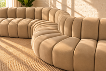 Load image into Gallery viewer, Hampton 8-piece arc sectional sofa in Honey Beige velvet with deep channel tufting and a sweeping curved modular configuration.