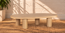 Load image into Gallery viewer, Henry Natural Blonde solid oak coffee table with organic rounded tabletop, four cylindrical wood legs, and visible natural oak grain.