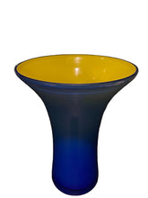 Load image into Gallery viewer, A translucent Holmeggard glass vase with a wide flared top, featuring a bright yellow interior and a blue-to-cobalt gradient exterior, set against a dark background.