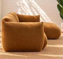 Load image into Gallery viewer, Hugh two-piece sectional sofa upholstered in textured camel brown chunky woven chenille with broad cushions and rounded arms.