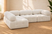 Load image into Gallery viewer, Janine 4-piece modular sectional sofa in Creamy White boucle with rounded cushions, deep tufting, and contemporary low-profile design.