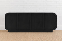 Load image into Gallery viewer, Jaylen charcoal mindi wood credenza with four cabinet doors, raised circular geometric details, rounded corners, and interior shelving.