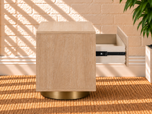 Load image into Gallery viewer, Jimena blonde oak two-drawer nightstand with brushed brass metal base and circular handle.