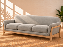 Load image into Gallery viewer, Image 3 of 5: Jules upholstered wooden sofa in Soft Ash with gray fabric, flared arms, contoured backrest, and solid Rubberwood frame