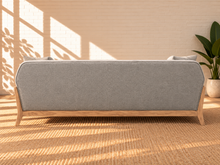Load image into Gallery viewer, Image 5 of 5: Jules upholstered wooden sofa in Soft Ash with gray fabric, flared arms, contoured backrest, and solid Rubberwood frame