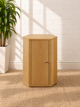 Load image into Gallery viewer, Kalel hexagonal oak side table with faceted wood veneer design, single cabinet door and interior shelf