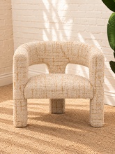 Load image into Gallery viewer, Kristine accent chair upholstered in textured cream and rust tweed with curved arms, open back details, and rounded cushioned seat.