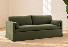 Load image into Gallery viewer, Liana olive linen-blend slipcovered sofa with deep bench cushion, two back cushions, and matching throw pillows