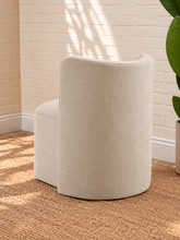 Load image into Gallery viewer, Lizbeth sand chenille accent chair with curved winged backrest, cushioned seat and fully upholstered rounded base.