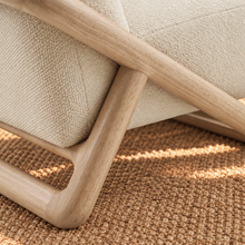 Load image into Gallery viewer, Lucia oatmeal textured lounge chair with rounded seat and back and sculptural curved natural wood sled frame