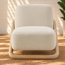 Load image into Gallery viewer, Lucia oatmeal textured lounge chair with rounded seat and back and sculptural curved natural wood sled frame