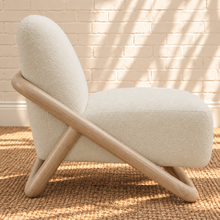 Load image into Gallery viewer, Lucia oatmeal textured lounge chair with rounded seat and back and sculptural curved natural wood sled frame