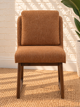 Load image into Gallery viewer, Lucy cushioned dining chair in cinnamon basketweave upholstery with a rounded sculptural back and rubber wood details.