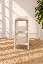Load image into Gallery viewer, Malie natural wood open shelf console with rounded ends, two open lower shelves and slender vertical wood supports.