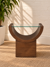 Load image into Gallery viewer, Marcel Natural Brown side table with curved oak veneer base and tempered glass top.